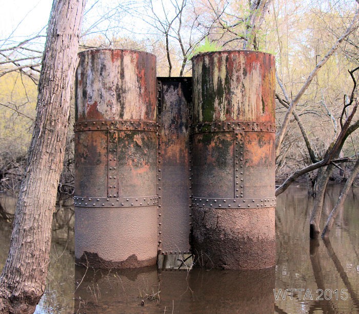Old metal railroad support beams at Mineola Nature Preserve. 
