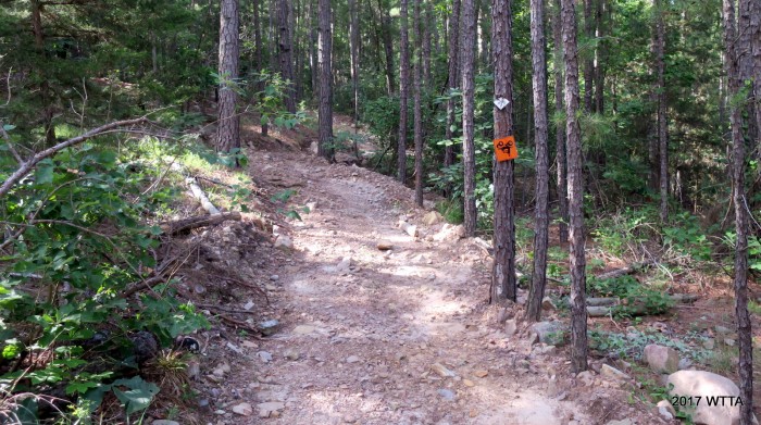 ATV trail along the rocky CNT, the ATV sign is upside down. 